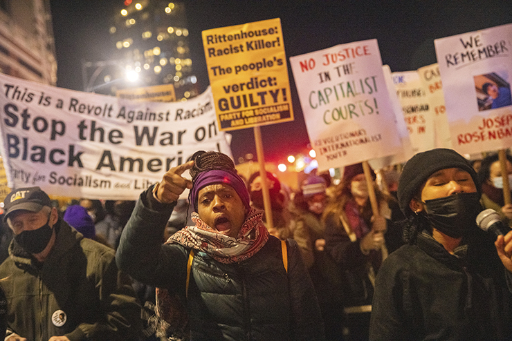 Protestors in Manhattan demonstrate on Nov. 19, 2021, after the acquittal of Kyle Rittenhouse of charges related to deadly shootings at a riot in Kenosha, Wisconsin (Jeenah Moon / Associated Press)