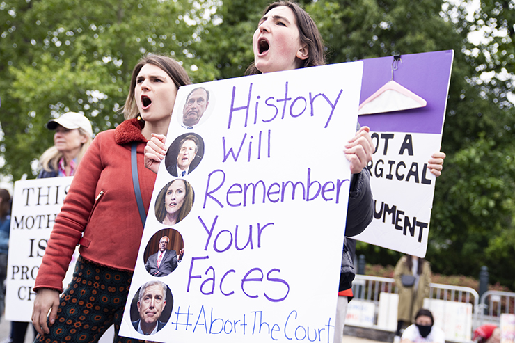 Protesters demonstrate outside the U.S. Supreme Court in response to the leaked draft opinion indicating the Court will overturn Roe v. Wade, on Mother's Day, Sunday, May 8, 2022. (Tom Williams/CQ Roll Call via AP Images)